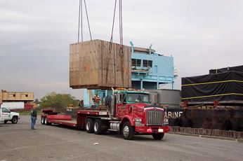 Unloading turbine at dock in Freeport
